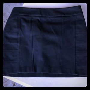Black fitted mini skirt